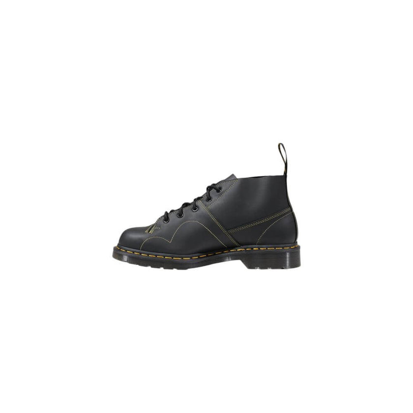 Black Leather Lace-Up BootsDiscover the Dr. Martens Church Greasy men’s ankle boots, an icon of style and comfort. Made from 100% high-quality leather, these boots provide unparalleled durability and resistance. The classic design is enhanced by distincti