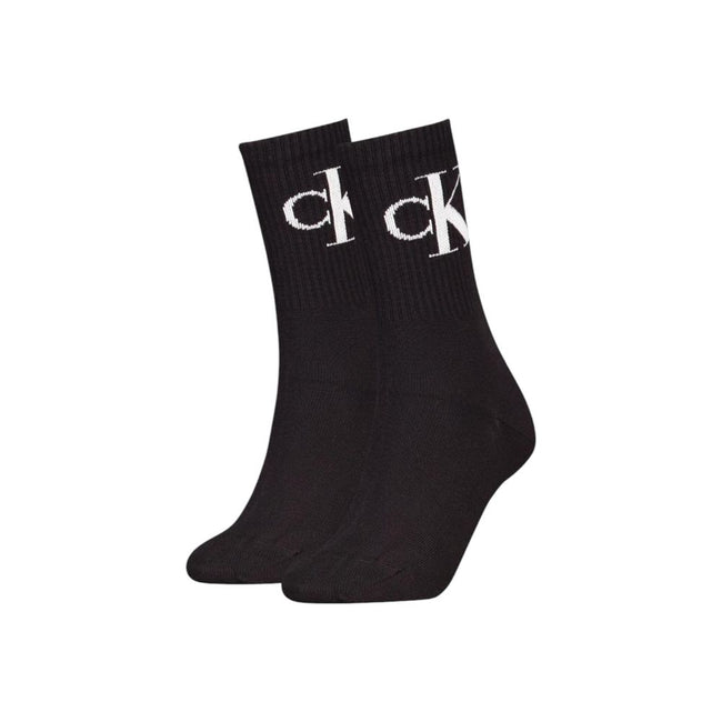 Black Cotton SocksDiscover the comfort and style of Calvin Klein Jeans CKJ WOMEN SOCK 2P MONOGRAM. Made with high-quality materials, these socks consist of 68% cotton, 28% polyester, 3% elastane/lycra, and 1% polyamide, ensuring a perfect fit and a soft f