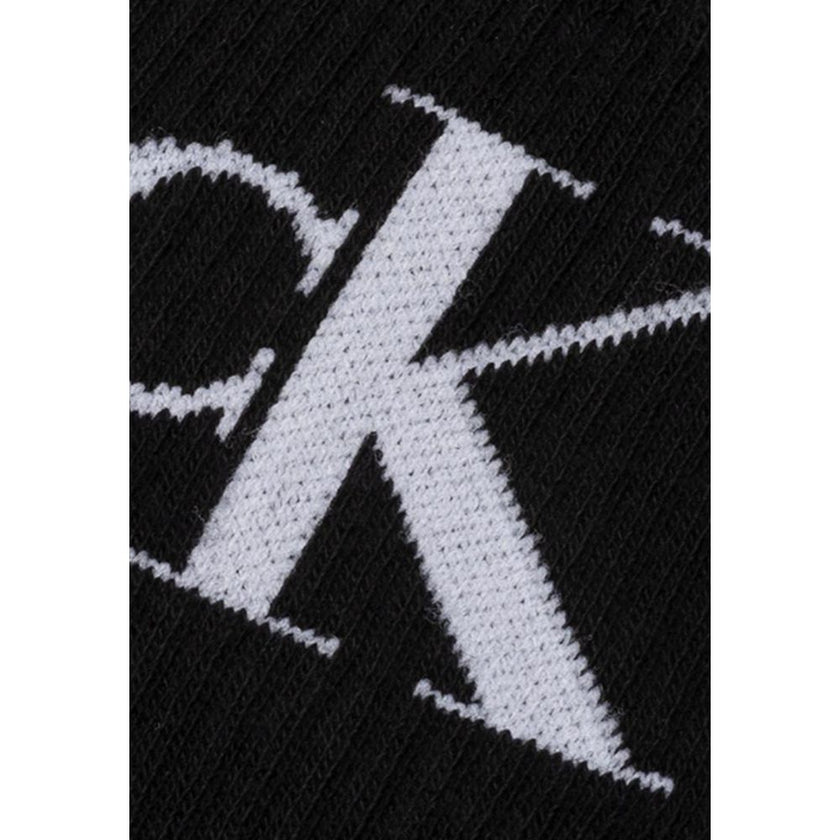 Black Cotton SocksDiscover the comfort and style of Calvin Klein Jeans CKJ WOMEN SOCK 2P MONOGRAM. Made with high-quality materials, these socks consist of 68% cotton, 28% polyester, 3% elastane/lycra, and 1% polyamide, ensuring a perfect fit and a soft f