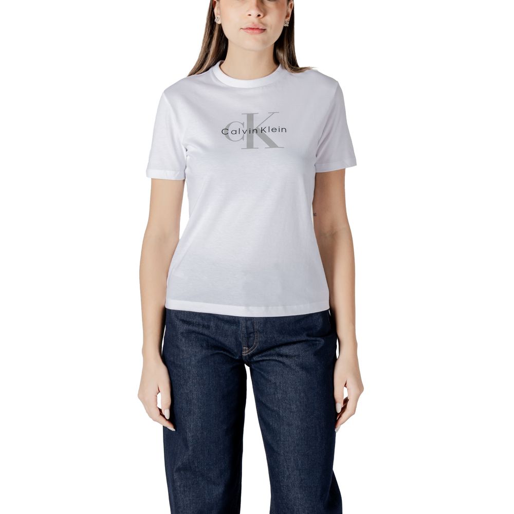 White Cotton T-ShirtDiscover casual elegance with the short-sleeve women’s t-shirt from Calvin Klein Jeans. Made from 100% cotton, this shirt offers exceptional comfort and a soft fit against the skin. The minimalist design is enhanced by the iconic brand