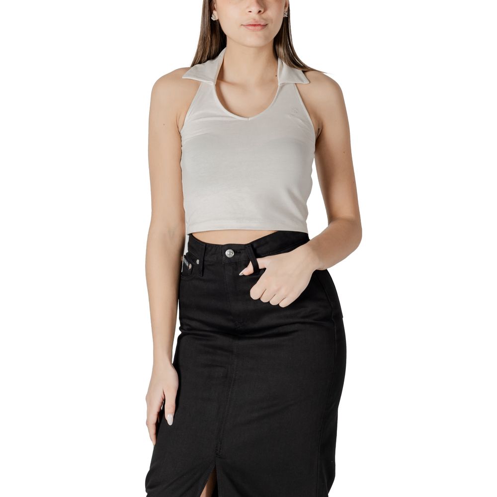 Beige Cotton TopDiscover the Calvin Klein Jeans HALTERNECK POLO COLLAR TOP J20J225320, a women’s t-shirt and tank top made from high-quality materials, featuring 97% cotton and 3% elastane/lycra. This piece stands out with its elegant and modern design, p