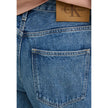 Blue Cotton Mom JeanThe Calvin Klein Jeans 90’S LOOSE J20J225069 mom and regular jeans for women are the perfect blend of comfort and style. Made from a composition of 80% cotton and 20% recycled cotton, these jeans provide an excellent fit while minimizi