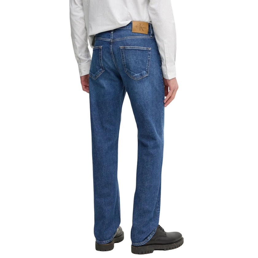 Blue Cotton Relaxed Fit JeansDiscover the regular/loose fit jeans for men by Calvin Klein Jeans, model STANDARD STRAIGHT J30J327016. Made with high-quality materials, these jeans consist of 79% cotton, 20% recycled cotton, and 1% elastane/lycra, ensuring