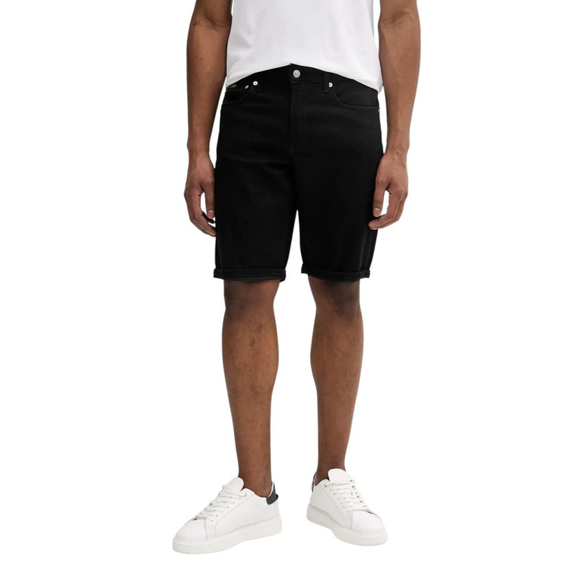 Black Cotton BermudaDiscover the Calvin Klein Jeans REGULAR J30J327195 men’s bermuda shorts, an essential piece for your summer wardrobe. Made from a blend of 94% cotton, 4% elastomultiester, and 2% elastane/lycra, these shorts provide a comfortable fit a