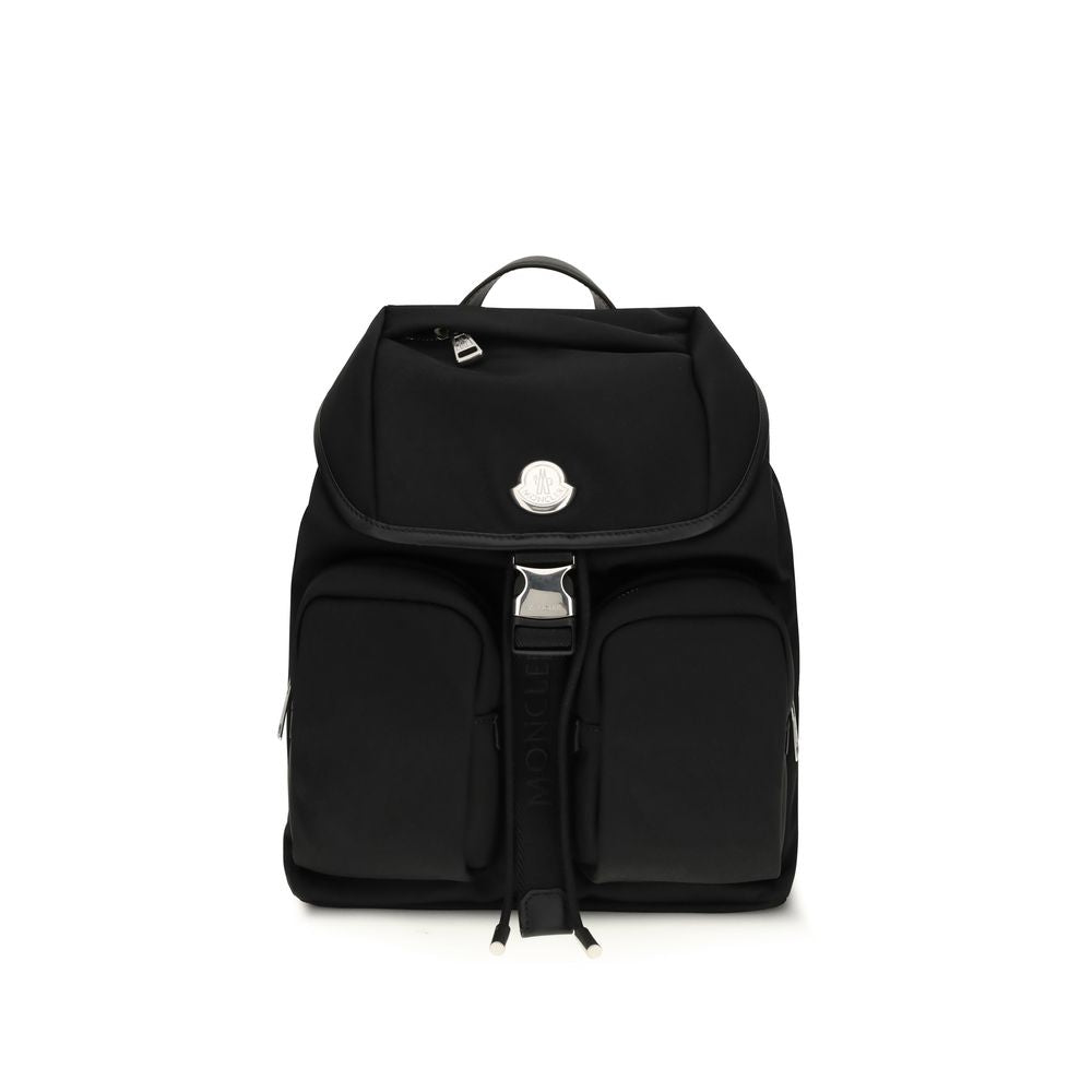 Black Nylon BackpackThe New Trick Backpack by Moncler is designed for everyday use, combining functionality and style. Made from water-repellent recycled nylon with a nylon lining, it features leather finishes and handle, adjustable shoulder straps, and a
