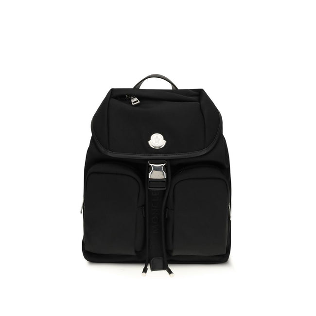 Black Nylon BackpackThe New Trick Backpack by Moncler is designed for everyday use, combining functionality and style. Made from water-repellent recycled nylon with a nylon lining, it features leather finishes and handle, adjustable shoulder straps, and a