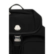 Black Nylon BackpackThe New Trick Backpack by Moncler is designed for everyday use, combining functionality and style. Made from water-repellent recycled nylon with a nylon lining, it features leather finishes and handle, adjustable shoulder straps, and a