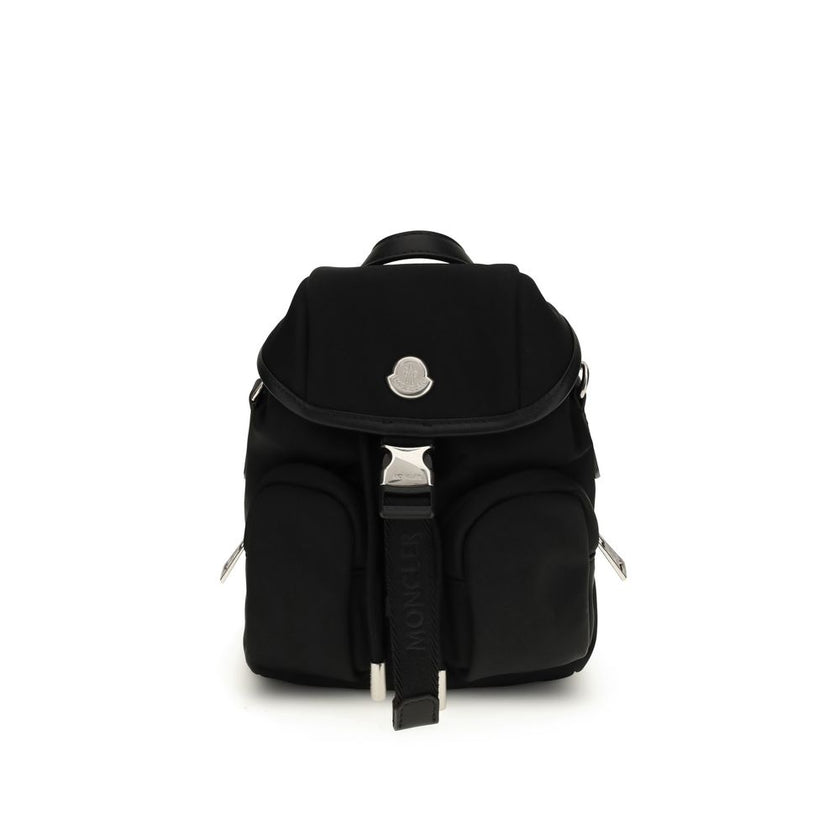 Black Leather BackpackThe Trick mini bag by Moncler is a compact reinterpretation of the iconic model, designed to stylishly meet everyday needs. Made of nylon drill with a nylon lining, it is enhanced with logo details. The leather handle and adjustable