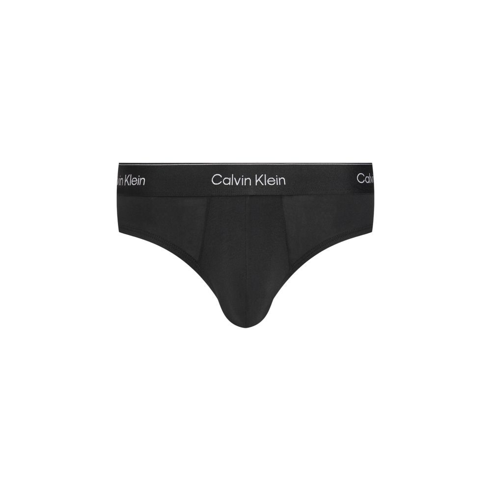 Blue Cotton BriefsDiscover timeless comfort and style with the Calvin Klein Underwear HIP BRIEF men’s slip pack of three. Made from high-quality materials, these briefs are composed of 95% cotton and 5% elastane/lycra, ensuring a perfect fit and a soft fe