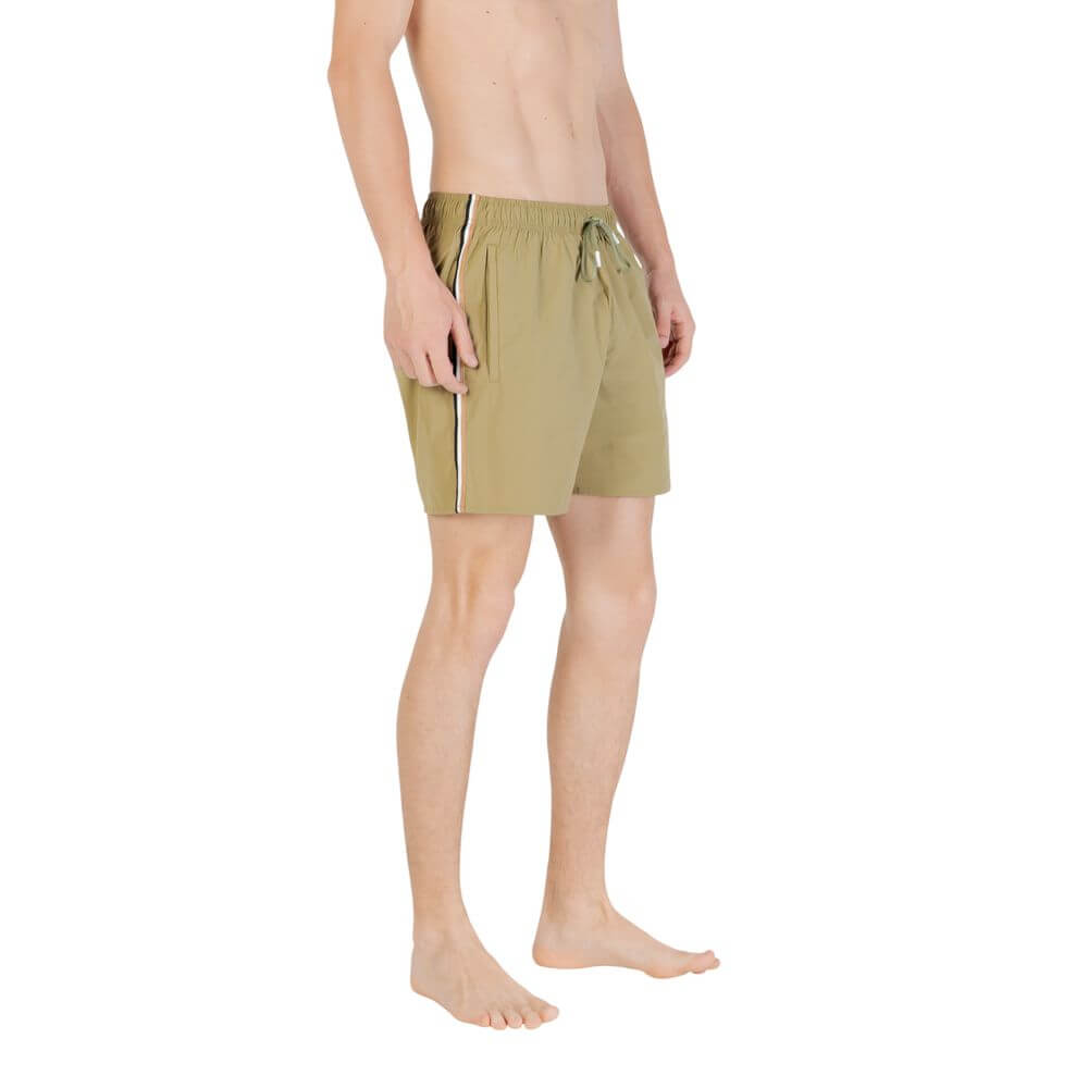 Green Polyester Swim ShortDiscover the Boss men’s swim shorts, model 10239741 50491594, made from 100% polyester for durability and comfort. These swim shorts are perfect for beach or pool days, thanks to their comfortable fit and elegant design. They fea