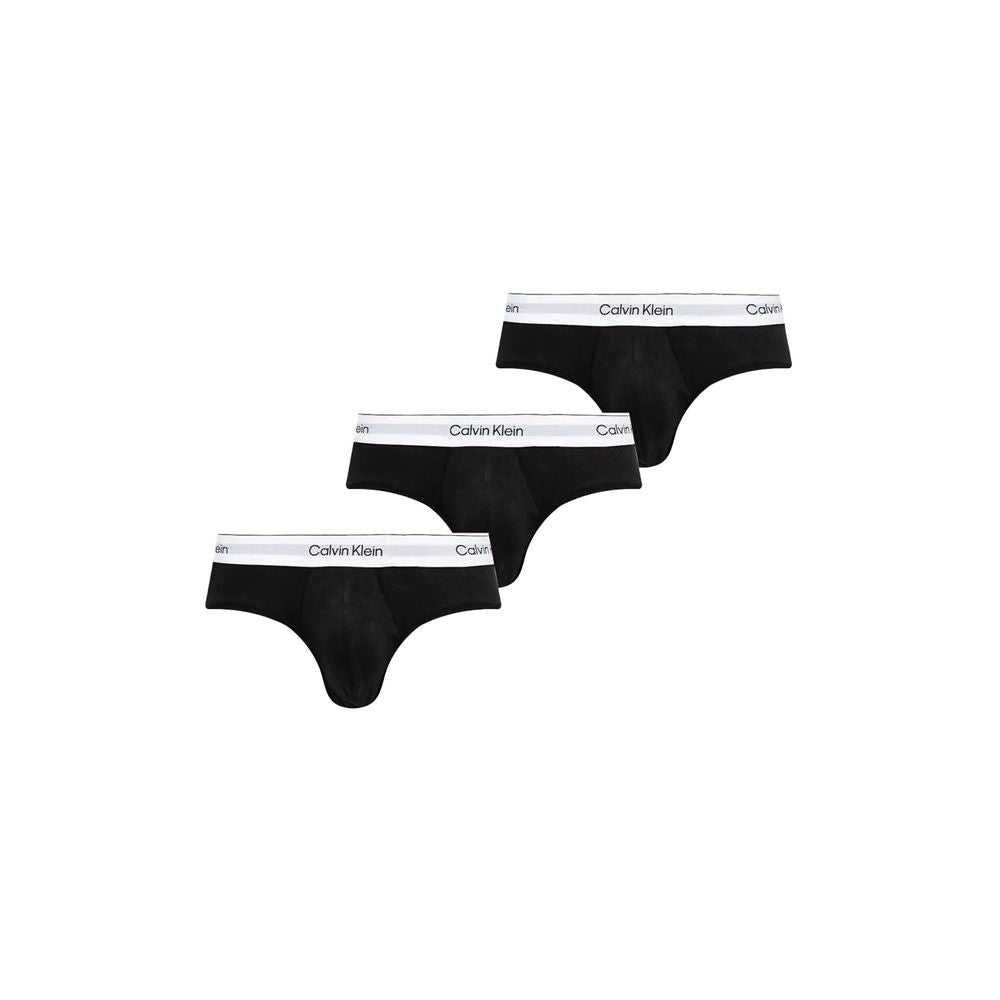Black And White Cotton BriefsDiscover timeless comfort and style with the Calvin Klein Underwear HIP BRIEF men’s slip pack of three. Made from high-quality materials, these briefs are composed of 95% cotton and 5% elastane/lycra, ensuring a perfect fit an