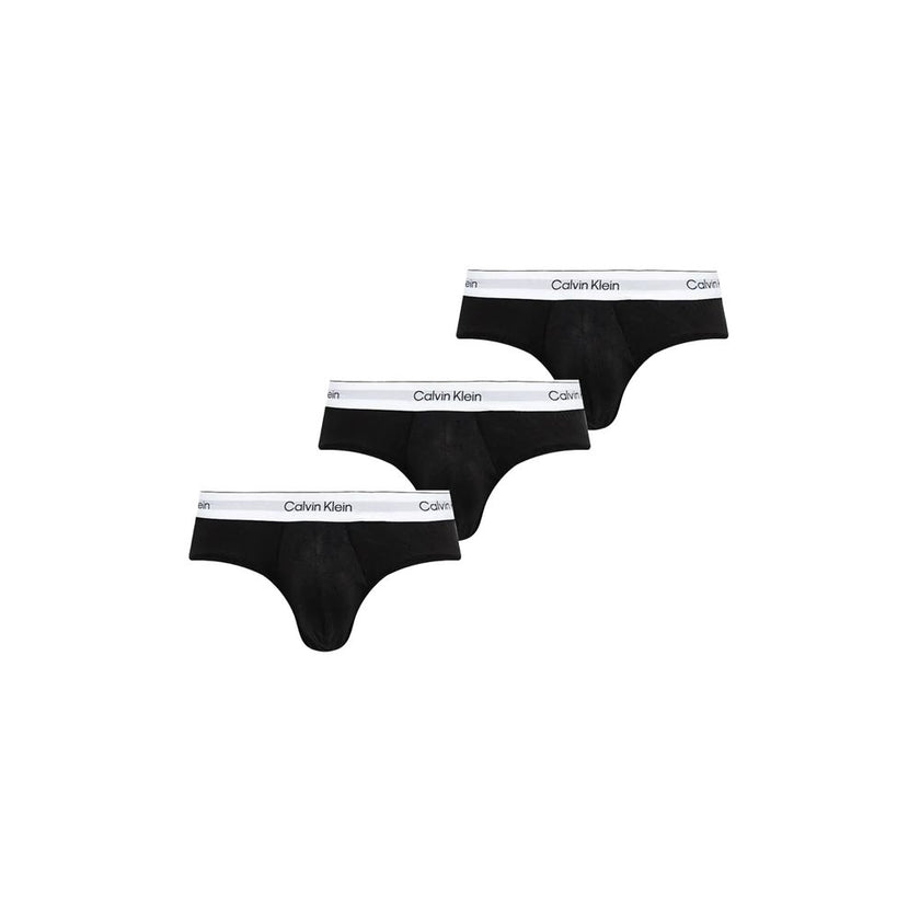 Black And White Cotton BriefsDiscover timeless comfort and style with the Calvin Klein Underwear HIP BRIEF men’s slip pack of three. Made from high-quality materials, these briefs are composed of 95% cotton and 5% elastane/lycra, ensuring a perfect fit an