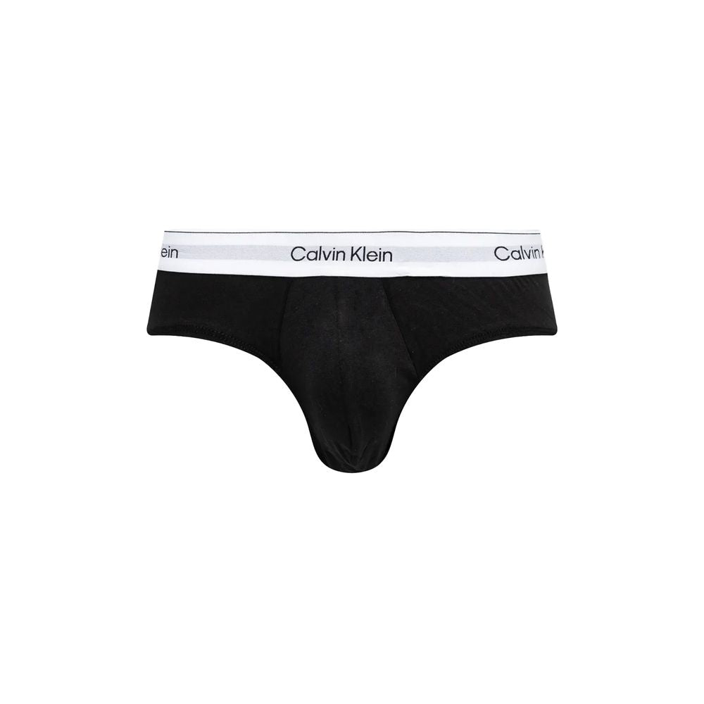 Black And White Cotton BriefsDiscover timeless comfort and style with the Calvin Klein Underwear HIP BRIEF men’s slip pack of three. Made from high-quality materials, these briefs are composed of 95% cotton and 5% elastane/lycra, ensuring a perfect fit an