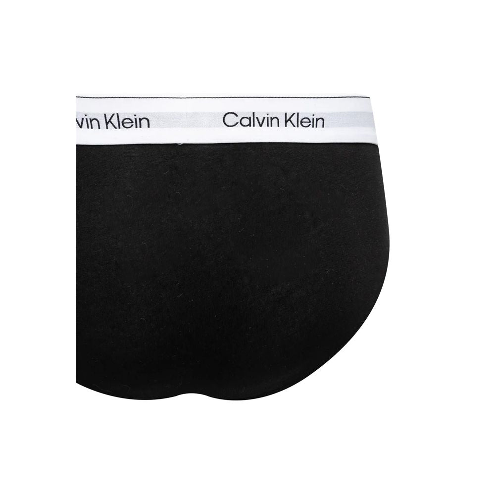 Black And White Cotton BriefsDiscover timeless comfort and style with the Calvin Klein Underwear HIP BRIEF men’s slip pack of three. Made from high-quality materials, these briefs are composed of 95% cotton and 5% elastane/lycra, ensuring a perfect fit an