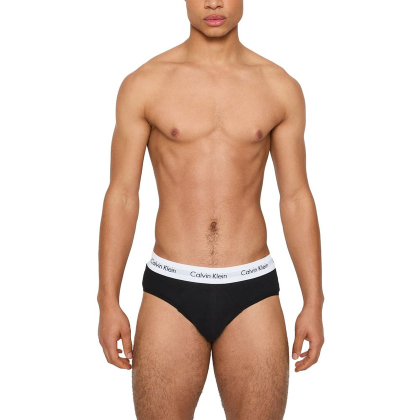 Black And White Cotton BriefsDiscover timeless comfort and style with the Calvin Klein Underwear HIP BRIEF men’s slip pack of three. Made from high-quality materials, these briefs are composed of 95% cotton and 5% elastane/lycra, ensuring a perfect fit an