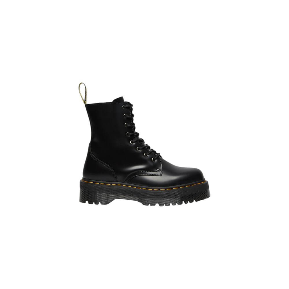 Black Leather Ankle BootsThe Jadon Polished Smooth boots by Dr. Martens are an icon of style and comfort. Made with a 100% leather upper, these boots offer exceptional durability and resistance. The lining, composed of 75% fabric and 25% leather, ensures