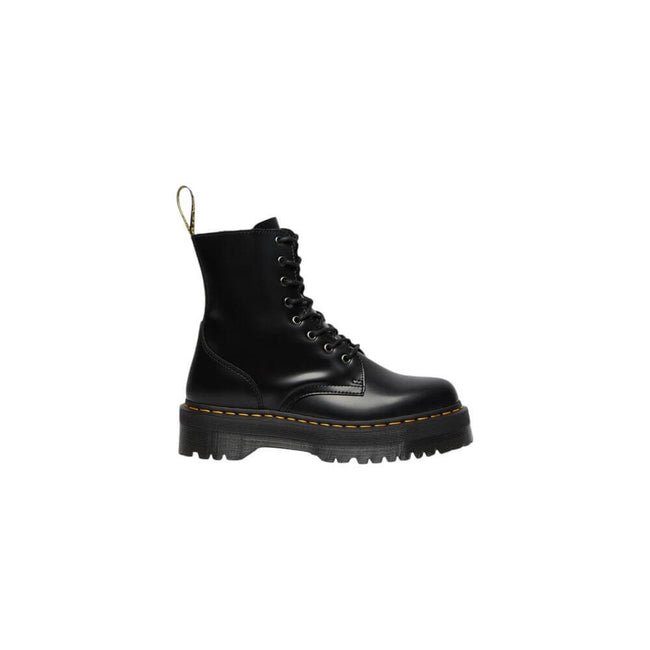 Black Leather Ankle BootsThe Jadon Polished Smooth boots by Dr. Martens are an icon of style and comfort. Made with a 100% leather upper, these boots offer exceptional durability and resistance. The lining, composed of 75% fabric and 25% leather, ensures