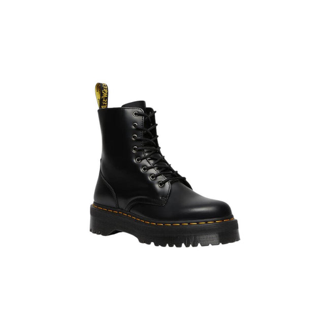Black Leather Ankle BootsThe Jadon Polished Smooth boots by Dr. Martens are an icon of style and comfort. Made with a 100% leather upper, these boots offer exceptional durability and resistance. The lining, composed of 75% fabric and 25% leather, ensures