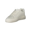 White Leather Women SneakerElevate your footwear collection with the quintessential blend of comfort and style from Calvin Klein. These chic sneakers boast a pristine white palette, accented by striking silver details that command attention. Designed for