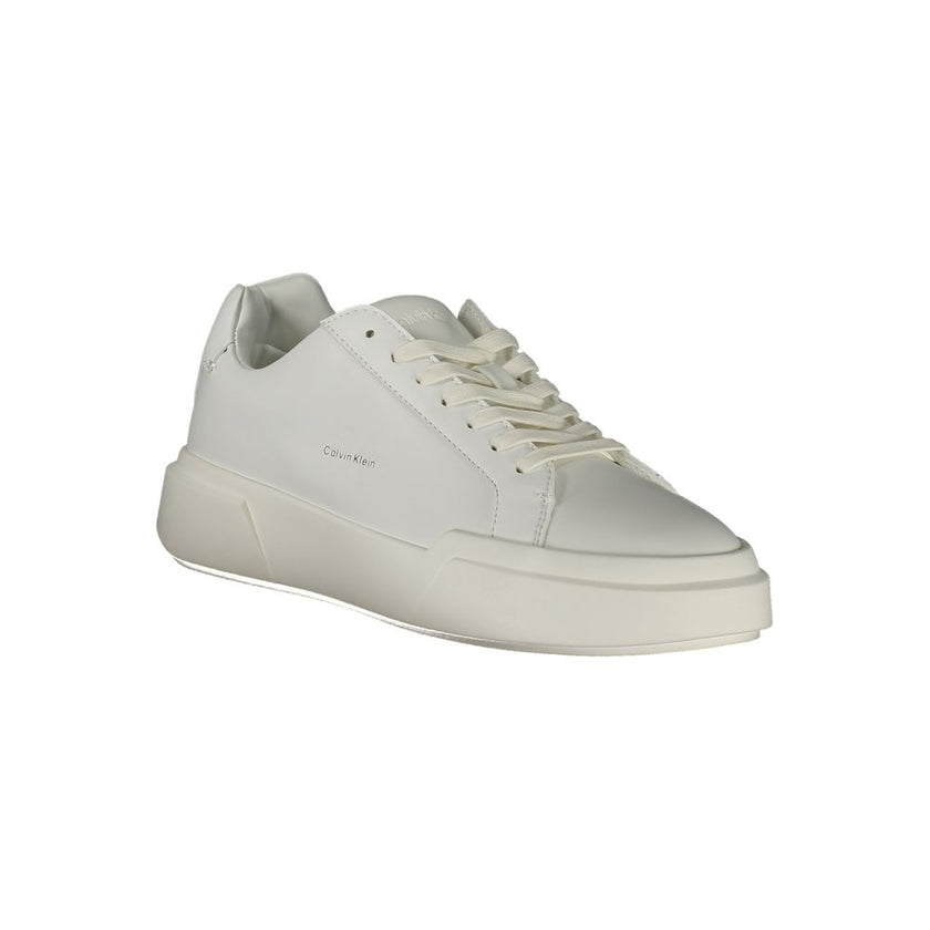 White Leather Women SneakerDare to step out in style with these Calvin Klein sneakers, where comfort meets chic in every stride. Boasting a crisp white palette and accented with the brand’s unmistakable logo, these lace-up shoes are designed to make a sta