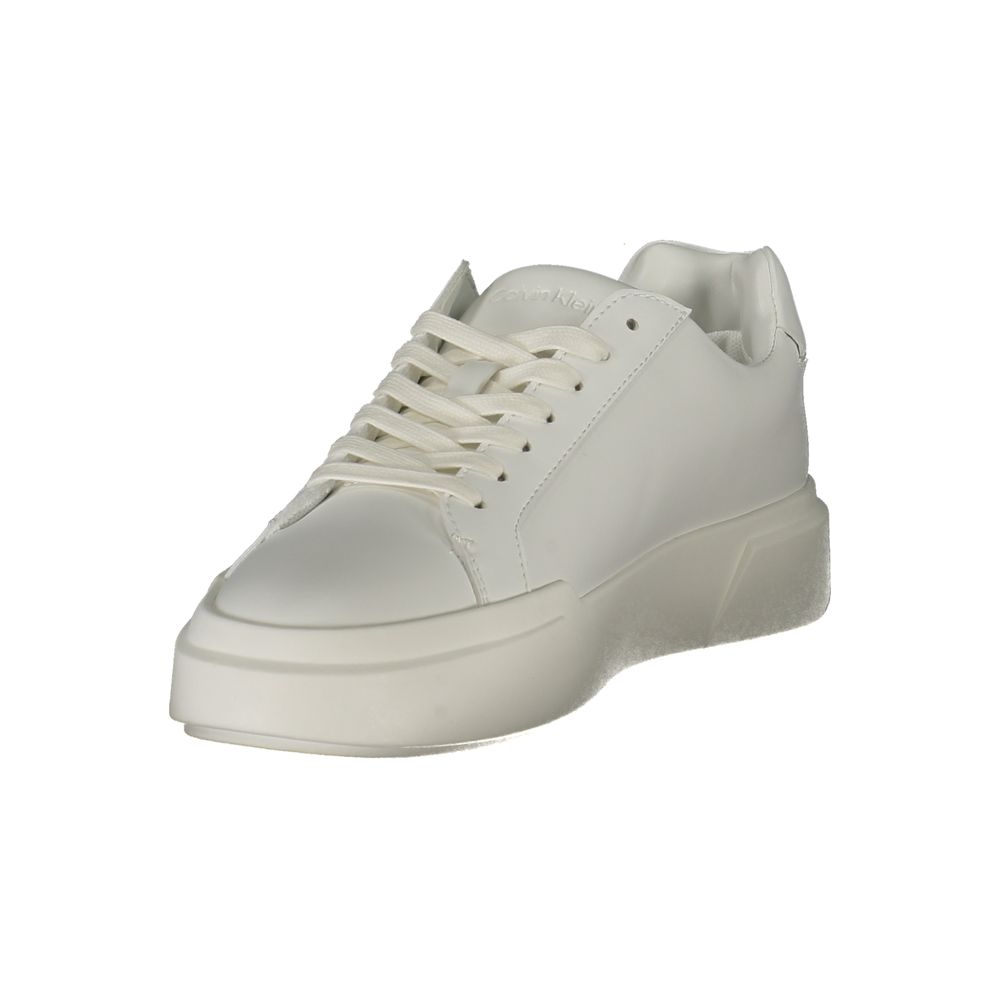 White Leather Women SneakerDare to step out in style with these Calvin Klein sneakers, where comfort meets chic in every stride. Boasting a crisp white palette and accented with the brand’s unmistakable logo, these lace-up shoes are designed to make a sta
