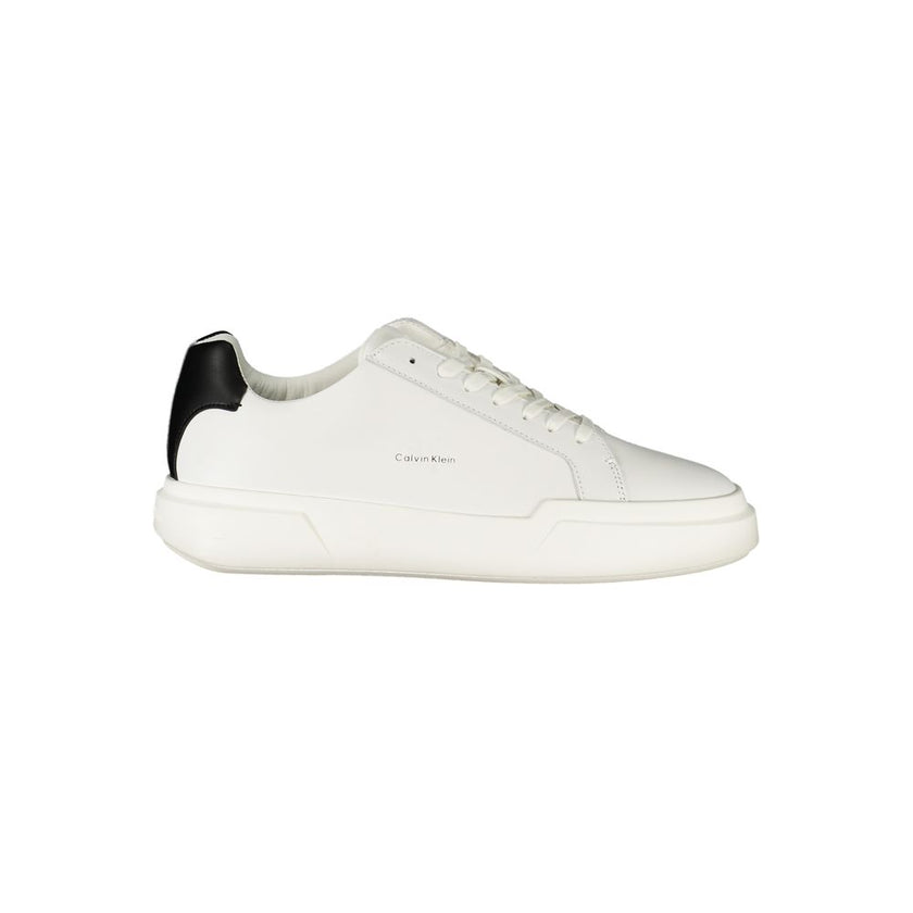 White Leather Men SneakerStep into the world of modern sophistication with Calvin Klein’s latest offering – a pair of sports shoes that effortlessly blend performance and panache. Designed with a keen eye on contemporary style, these sneakers feature cris