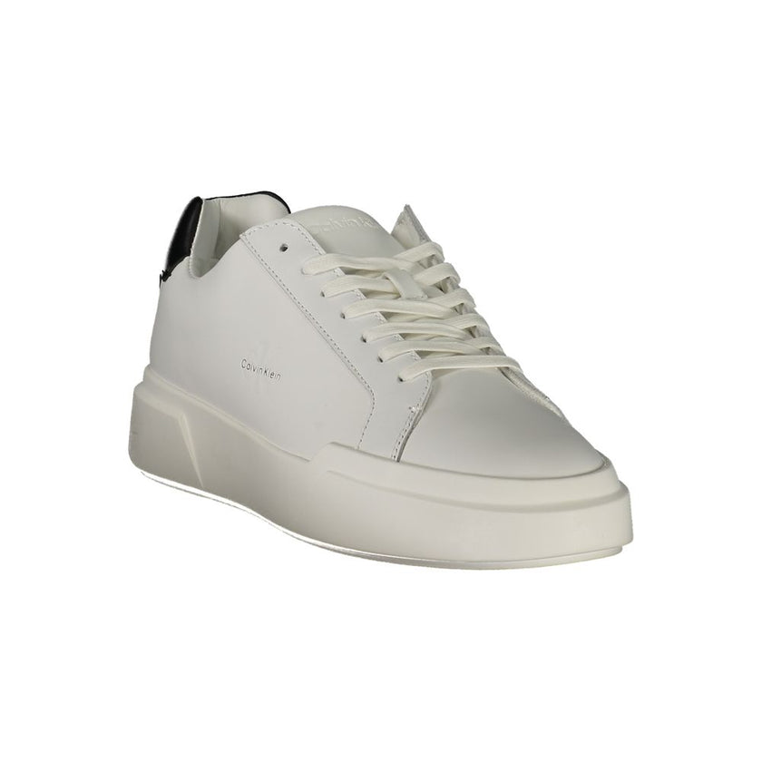 White Leather Men SneakerStep into the world of modern sophistication with Calvin Klein’s latest offering – a pair of sports shoes that effortlessly blend performance and panache. Designed with a keen eye on contemporary style, these sneakers feature cris