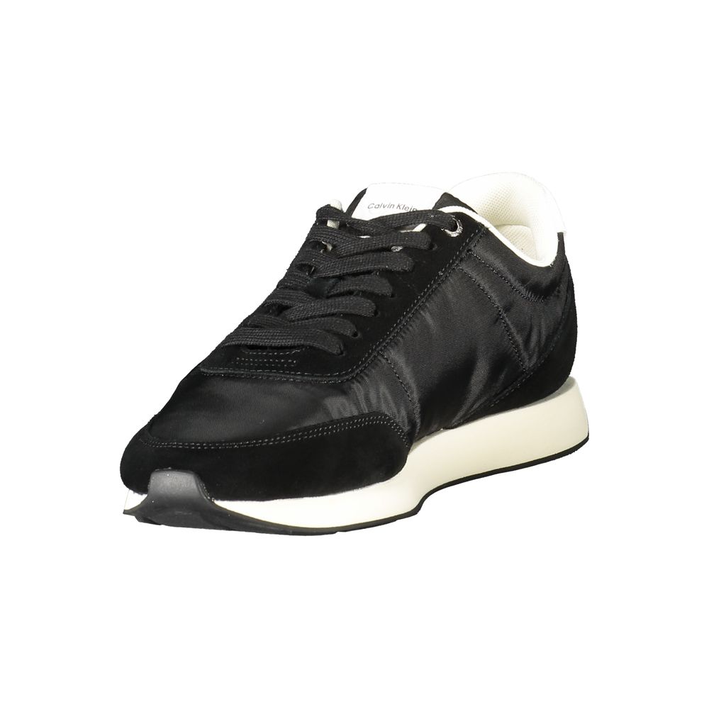 Black Recycled Polyester Men SneakerStep into the world of eco-conscious fashion with Calvin Klein’s striking sneakers that blend style, sustainability, and sporty sophistication. This pair captivates with its sleek black design, accented by eye-catching