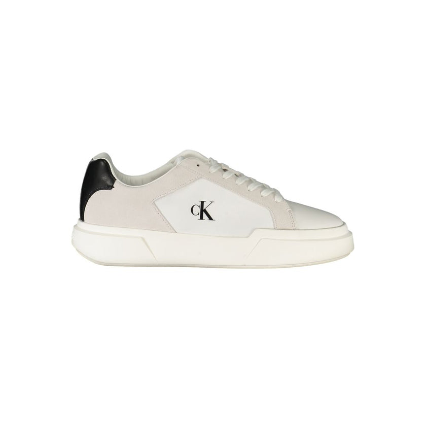 White Leather Men SneakerUnleash your stride with Calvin Klein’s latest fusion of style and comfort in these sleek sneakers. Boasting a modern design with striking black accents, they cater to those who stand confidently at the intersection of fashion and