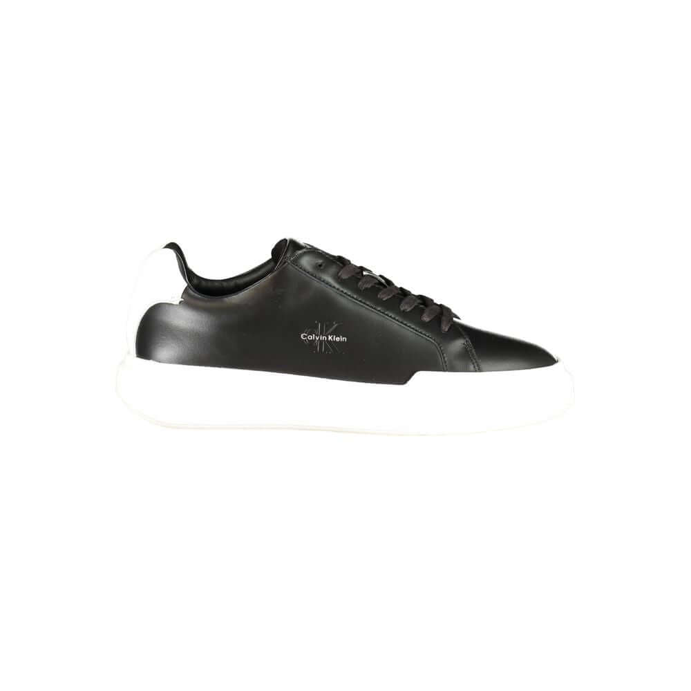Black Leather Men's SneakerElevate your athletic ensemble with Calvin Klein’s latest offering—sleek sports shoes designed to turn heads and enhance performance. These sneakers boast a bold black base with striking white contrasts that command attention. E