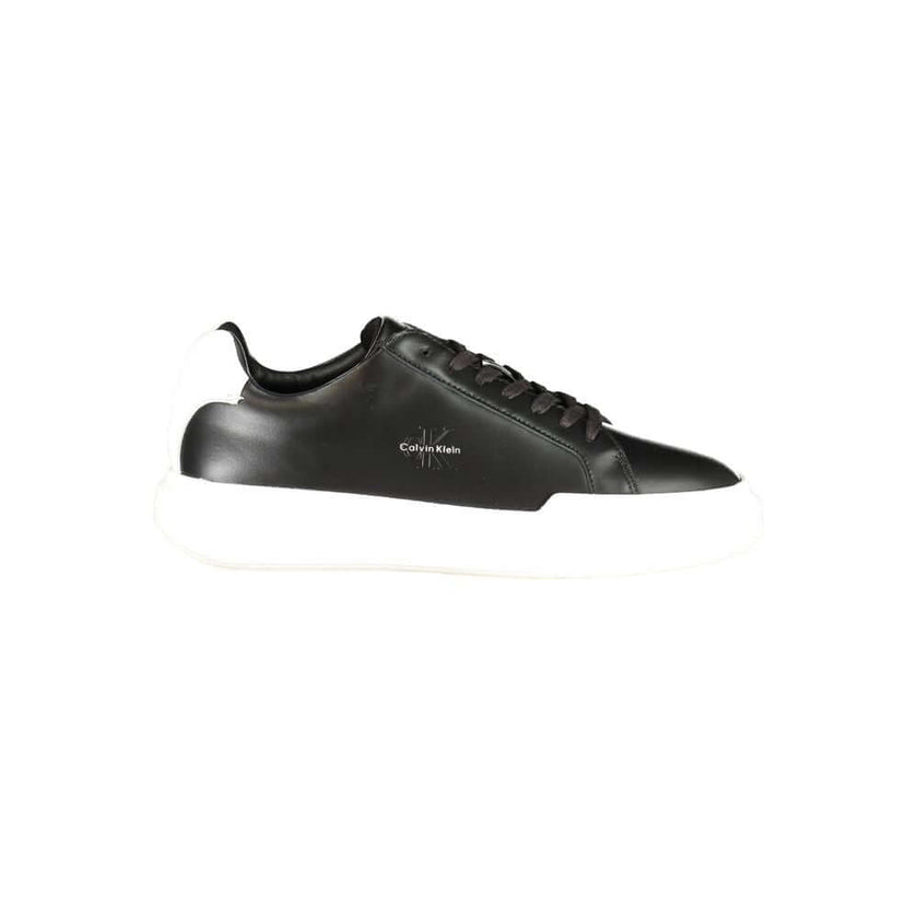 Black Leather Men's SneakerElevate your athletic ensemble with Calvin Klein’s latest offering—sleek sports shoes designed to turn heads and enhance performance. These sneakers boast a bold black base with striking white contrasts that command attention. E