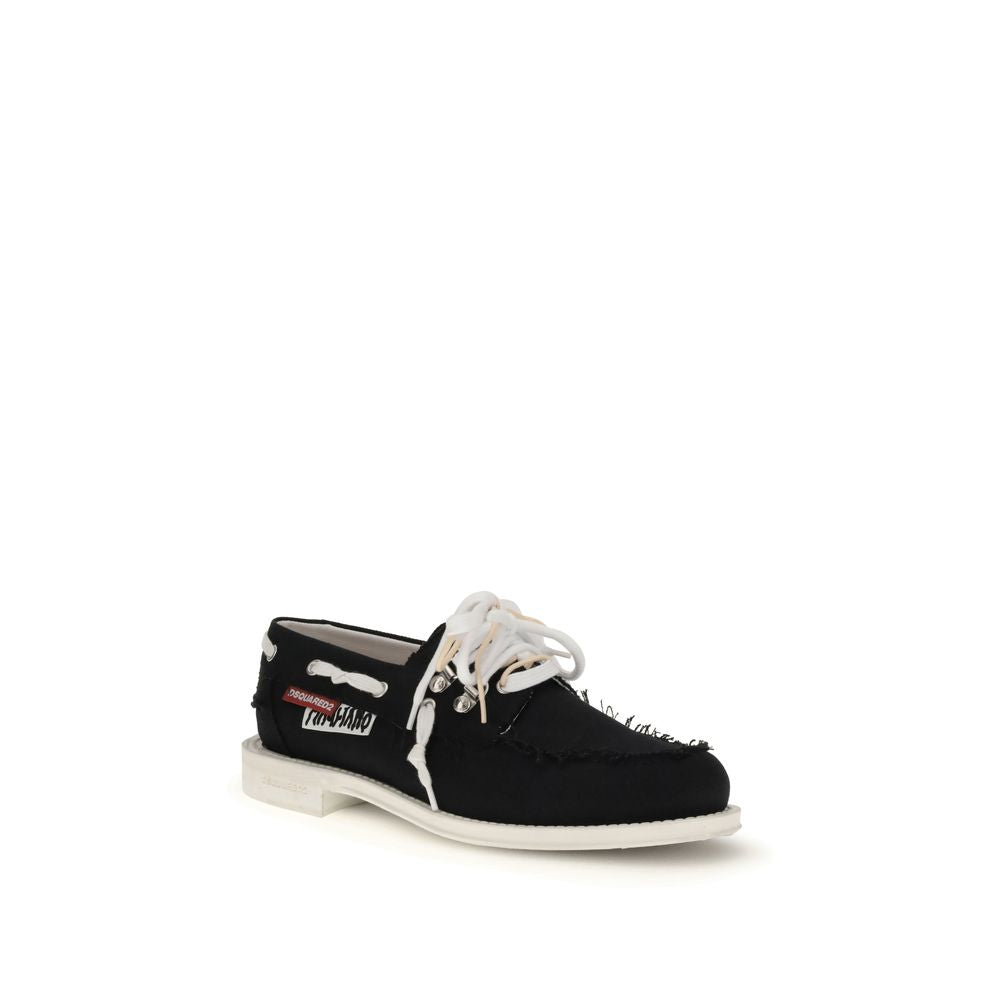 Black Cotton Slip-On LoafersThe Boat Shoes by Dsquared2 combine traditional structure with lightweight materials. Featuring a cotton upper and a white rubber sole, they offer comfort, breathability, and practicality. Ideal for those seeking a relaxed yet