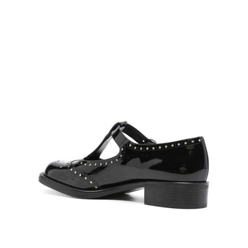 Black Calfskin MoccassinDescription: – Composition: 100% calf leather – Inner: Leather – Insole: Leather – Sole: Leather – Round toe – Patent effect – Perforated detail – Cut-out detail – Adjustable buckle closure – Branded insole – Heel 3 cm – Made in It