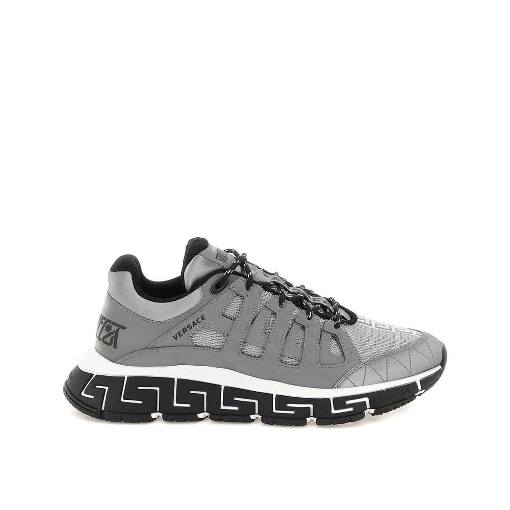 Silver Fabric Athletic SneakersDescription: – Composition: – Fabric – Leather details – Rubber sole – Lace up – Front and back logo detail – Made in Italy –Silver Fabric Athletic Sneakers${tagsVersaceAulae Silver Fabric Athletic Sneakers VersaceAulae Silv