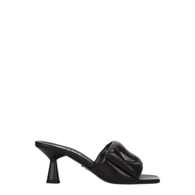 Black Leather Platform SandalsDescription: The product with MPN 1XX6542DL8065F0002 and code F76042 leather in black is a sandals designed by Prada. It has features like front logo. Additional Info: Style: Casual Materials: Leather Shoe sole: Leather Heel