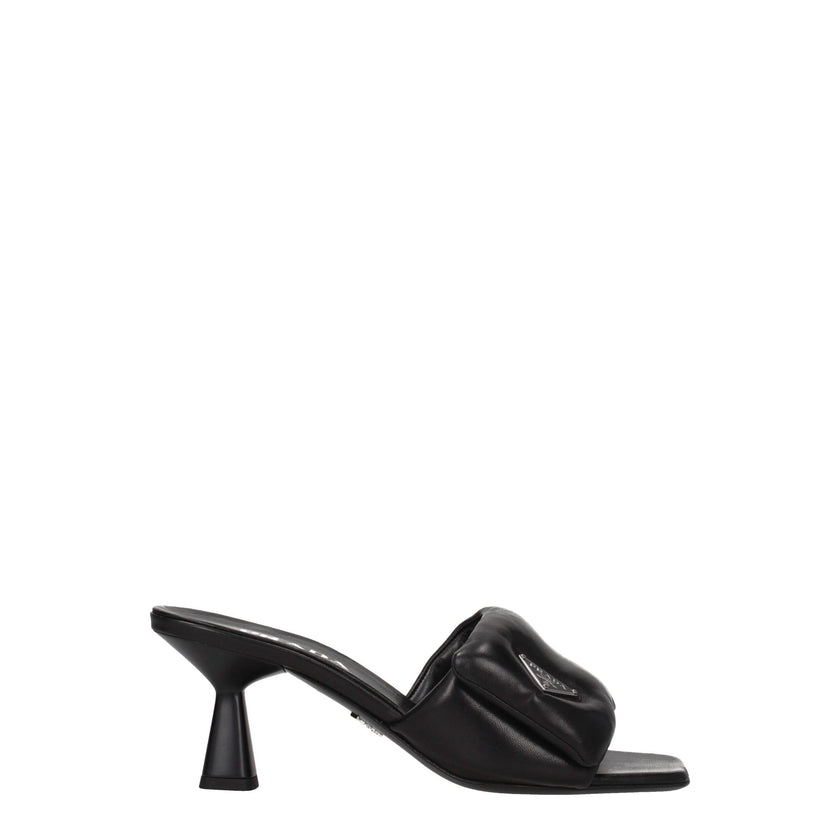 Black Leather Platform SandalsDescription: The product with MPN 1XX6542DL8065F0002 and code F76042 leather in black is a sandals designed by Prada. It has features like front logo. Additional Info: Style: Casual Materials: Leather Shoe sole: Leather Heel