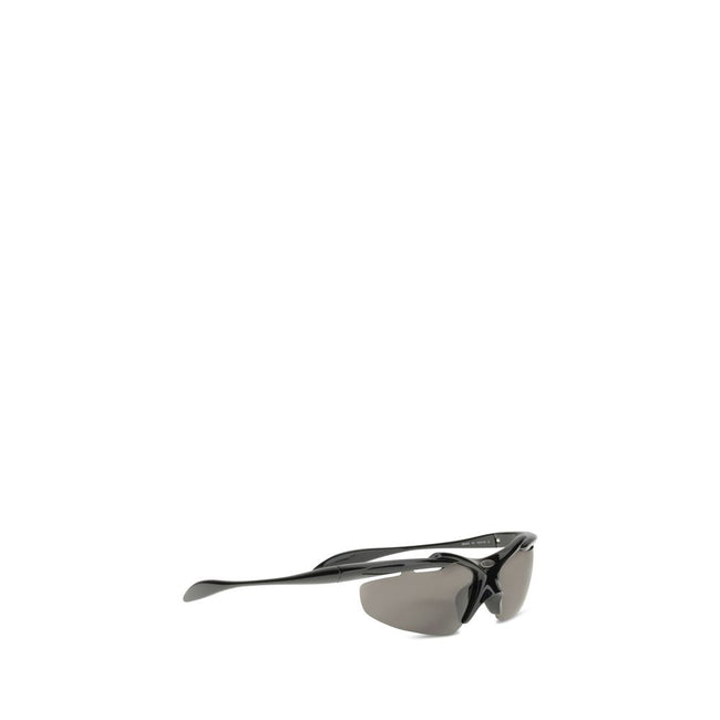 Black Polyamide SunglassesThe Turbo D-frame Sunglasses by Balenciaga combine sporty design with innovative materials. Featuring a D-frame shape with smart fit and flexible temples for optimal comfort, they are equipped with metal hinges for durability. Th