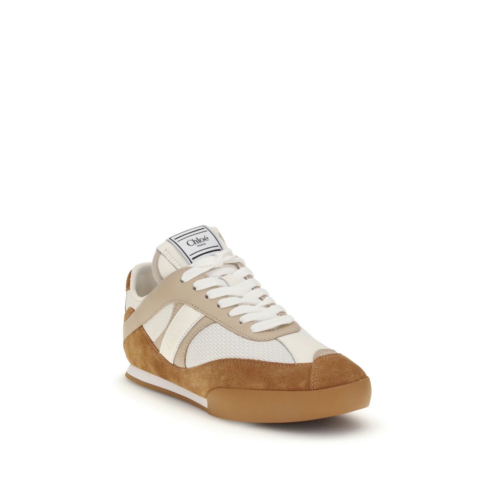 Brown Calf Leather Bos Taurus Athletic SneakersThe Kick Sneakers by Chloé are inspired by the worlds of ballet and boxing. Made from recycled technical mesh and a mix of smooth and suede calfskin, they feature an updated design with a lighter silhouette a