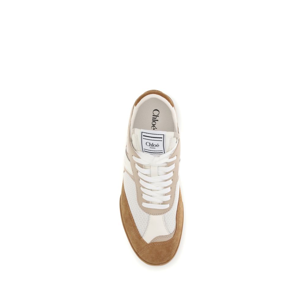 Brown Calf Leather Bos Taurus Athletic SneakersThe Kick Sneakers by Chloé are inspired by the worlds of ballet and boxing. Made from recycled technical mesh and a mix of smooth and suede calfskin, they feature an updated design with a lighter silhouette a