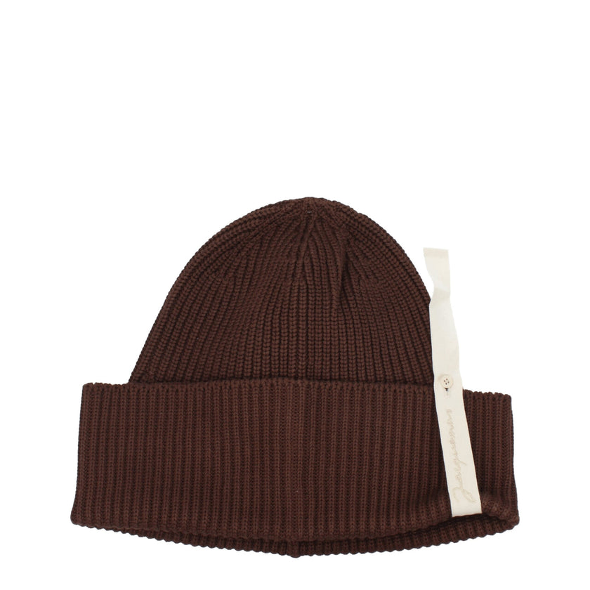 Brown Cotton BeanieDescription: The product with MPN 235AC5475045850 and code F78011 cotton in brown is a hats designed by Jacquemus. It has features like side logo. Additional Info: Style: Casual Materials: Cotton Composition: 100% cotton MPN: 235AC54750