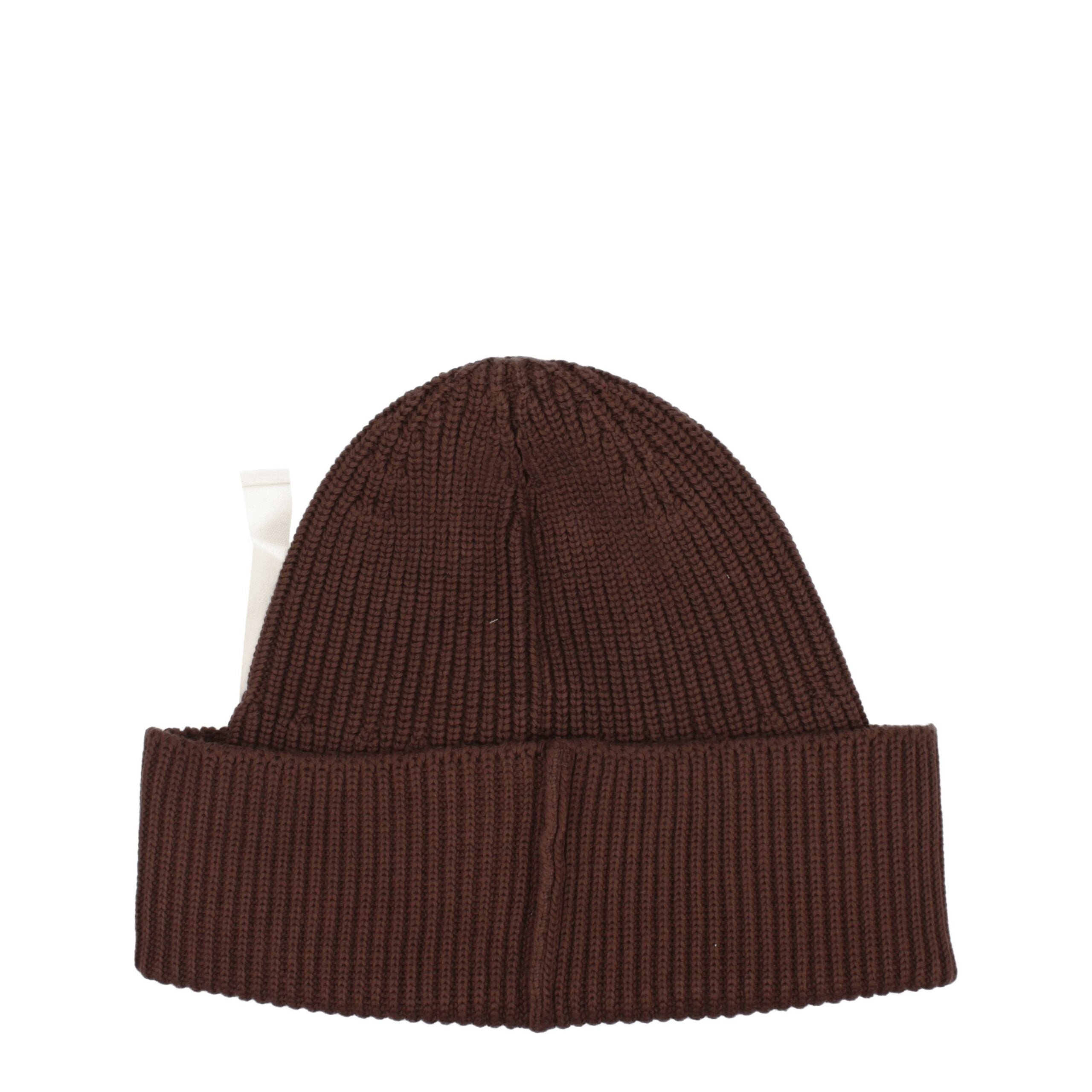 Brown Cotton BeanieDescription: The product with MPN 235AC5475045850 and code F78011 cotton in brown is a hats designed by Jacquemus. It has features like side logo. Additional Info: Style: Casual Materials: Cotton Composition: 100% cotton MPN: 235AC54750