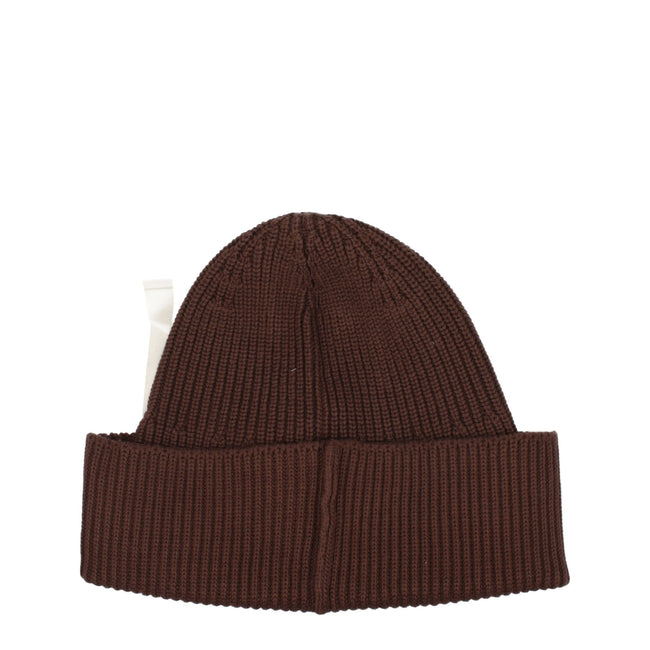Brown Cotton BeanieDescription: The product with MPN 235AC5475045850 and code F78011 cotton in brown is a hats designed by Jacquemus. It has features like side logo. Additional Info: Style: Casual Materials: Cotton Composition: 100% cotton MPN: 235AC54750