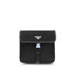 Black Recycled Polyamide Shoulder BagPrada’s re-nylon and saffiano Shoulder Bag combines contemporary style and practicality. It features an adjustable ribbon and leather shoulder strap, a flap closure and snap system, and has an enameled metal triangle l
