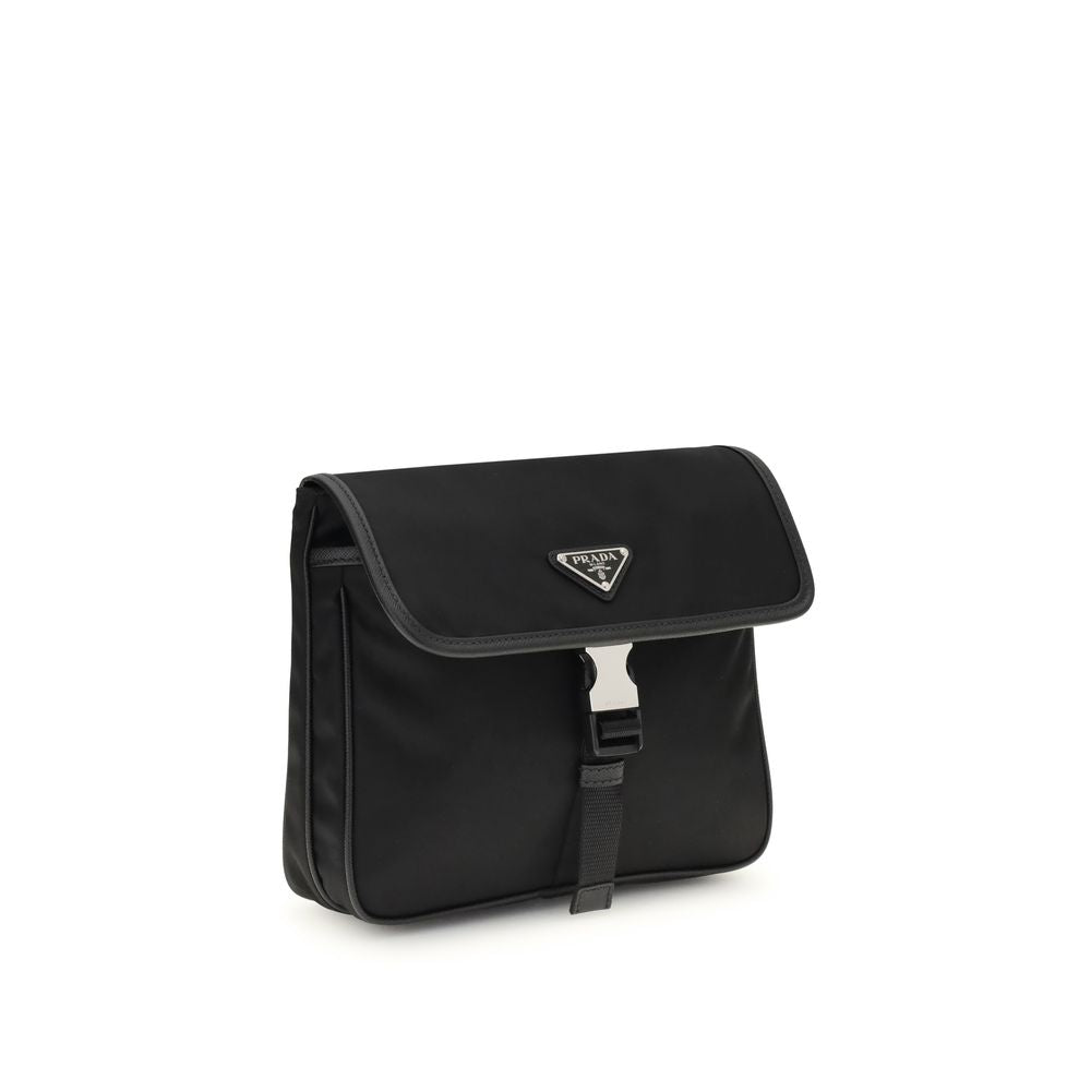 Black Recycled Polyamide Shoulder BagPrada’s re-nylon and saffiano Shoulder Bag combines contemporary style and practicality. It features an adjustable ribbon and leather shoulder strap, a flap closure and snap system, and has an enameled metal triangle l