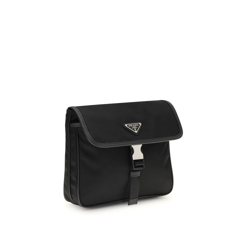 Black Recycled Polyamide Shoulder BagPrada’s re-nylon and saffiano Shoulder Bag combines contemporary style and practicality. It features an adjustable ribbon and leather shoulder strap, a flap closure and snap system, and has an enameled metal triangle l