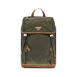 Green Recycled Polyamide BackpackPrada’s re-nylon Backpack combines practicality and sustainable style. Featuring two adjustable shoulder straps and a handle, it has a front flap closure secured by external buckles and an internal drawstring closure for a