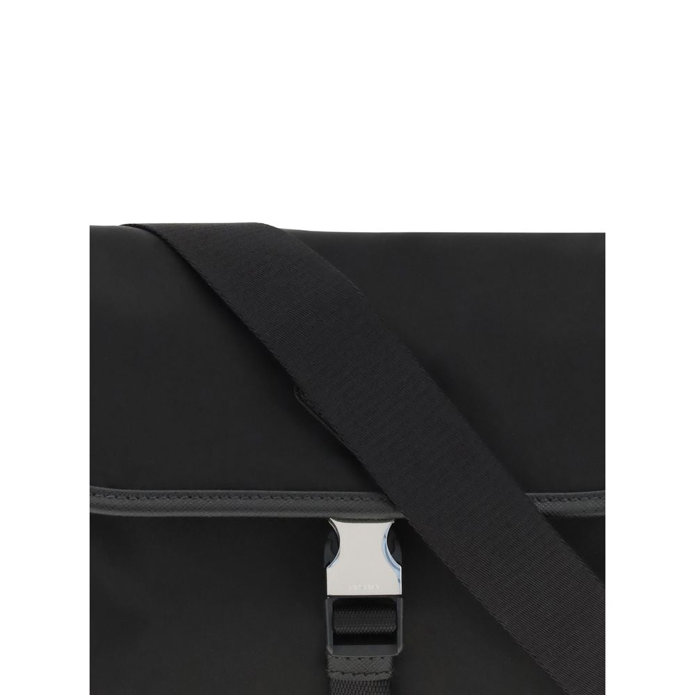 Black Recycled Polyamide Shoulder BagPrada’s re-nylon and saffiano Shoulder Bag combines contemporary style and practicality. It features an adjustable ribbon and leather shoulder strap, a flap closure and snap system, and has an enameled metal triangle l