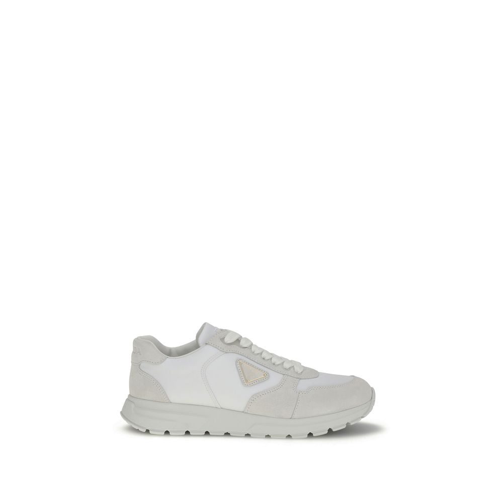 White Recycled Polyamide Athletic SneakersPrada’s Prax 2.0 Sneakers combine Re-Nylon and suede in a contemporary and elegant design. Featuring cotton lace-up fastening, they are embellished with the classic enameled metal triangle logo, the distinctive sy