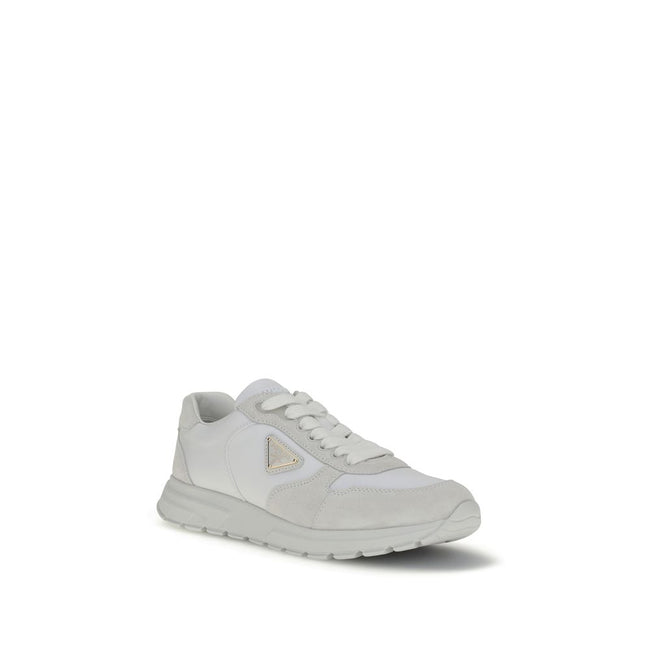 White Recycled Polyamide Athletic SneakersPrada’s Prax 2.0 Sneakers combine Re-Nylon and suede in a contemporary and elegant design. Featuring cotton lace-up fastening, they are embellished with the classic enameled metal triangle logo, the distinctive sy
