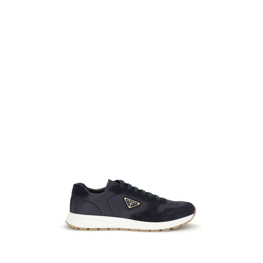 Blue Recycled Polyamide Athletic SneakersPrax 01 re-nylon Sneakers by Prada blend contemporary aesthetics and innovative materials. The upper with nylon lace loops lends a technical, modern look, enhanced by the enameled metal triangle logo and screen-pri